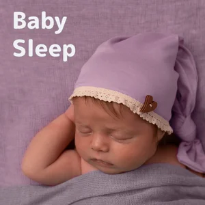 Baby sleeping peacefully in a cozy crib under a starry night sky